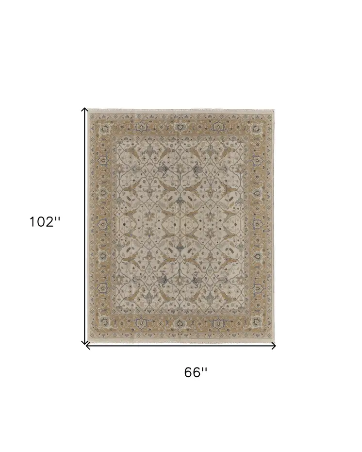 6' X 9' Ivory Gray and Tan Wool Oriental Hand Knotted Area Rug With Fringe