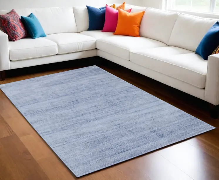 5' X 8' Blue and Ivory Power Loom Area Rug
