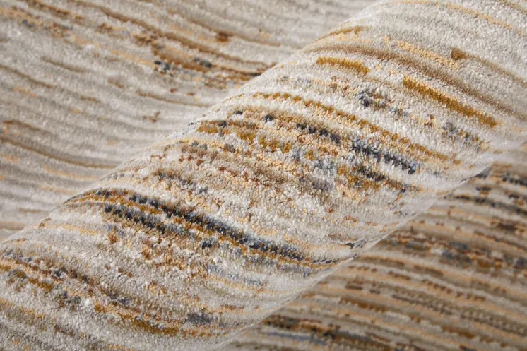 7' X 10' Ivory and Tan Abstract Power Loom Worn Faded Area Rug
