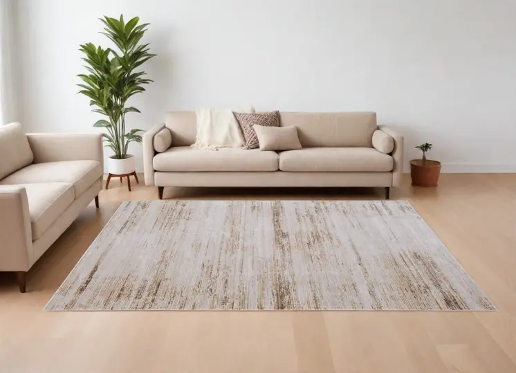 8' X 10' Ivory and Tan Abstract Power Loom Worn Faded Area Rug