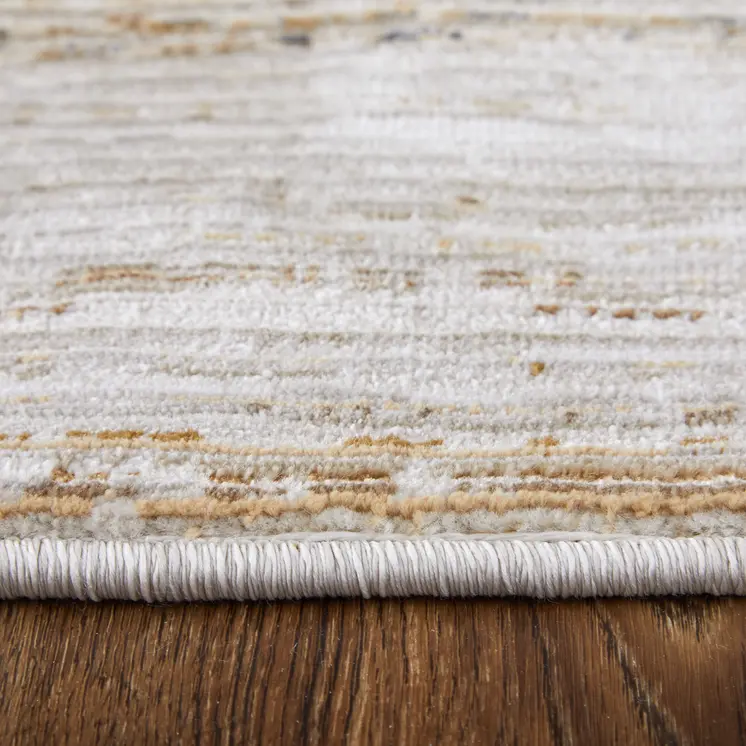 2' X 3' Ivory and Tan Abstract Power Loom Worn Faded Area Rug