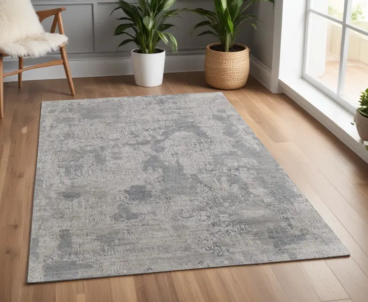4' X 6' Gray and Silver Abstract Hand Woven Worn Faded Area Rug