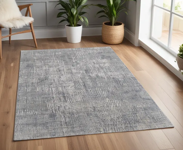 4' X 6' Gray and Silver Abstract Hand Woven Worn Faded Area Rug