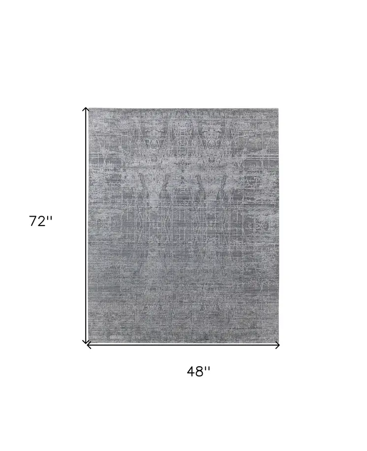 4' X 6' Gray and Silver Abstract Hand Woven Worn Faded Area Rug