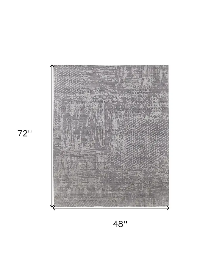 4' X 6' Gray and Silver Abstract Hand Woven Worn Faded Area Rug