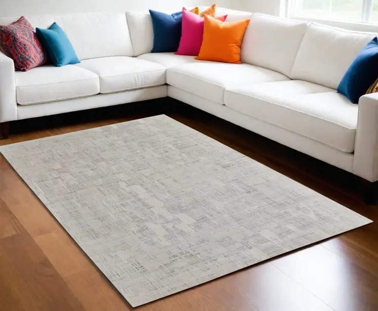 5' X 8' Ivory and Gray Abstract Hand Woven Worn Faded Area Rug