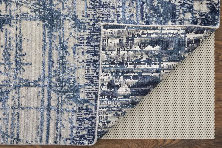 4' X 6' Blue and Ivory Abstract Hand Woven Worn Faded Area Rug