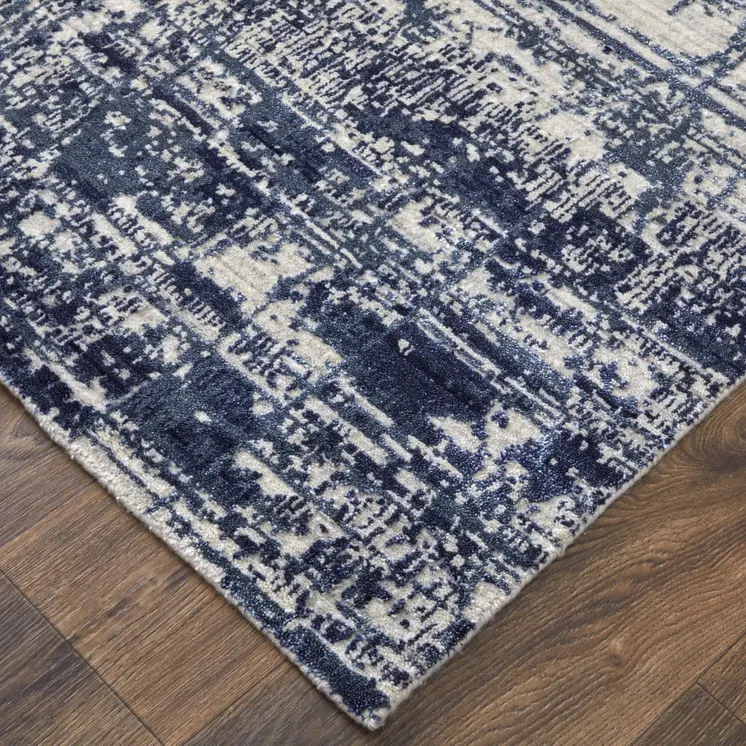 8' X 10' Blue and Ivory Abstract Hand Woven Worn Faded Area Rug