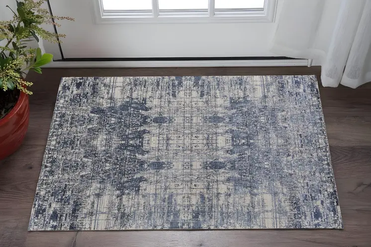 2' X 3' Blue and Ivory Abstract Hand Woven Worn Faded Area Rug