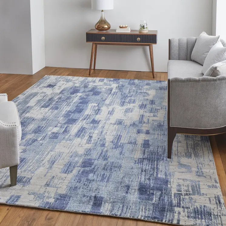 5' X 8' Blue and Ivory Abstract Hand Woven Worn Faded Area Rug