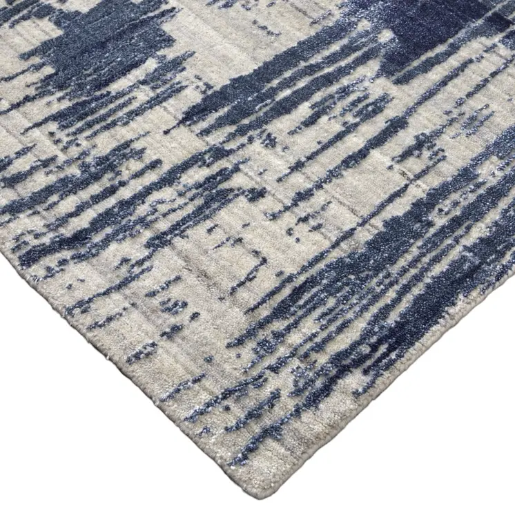 9' X 12' Blue and Ivory Abstract Hand Woven Distressed Area Rug