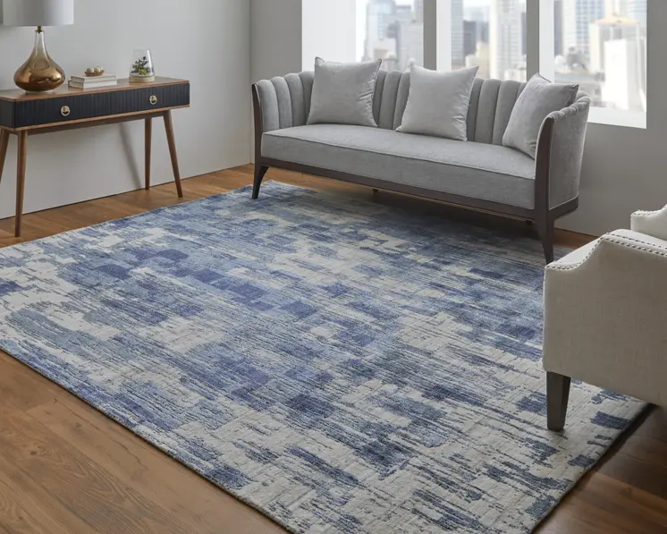 2' X 3' Blue and Ivory Abstract Hand Woven Worn Faded Area Rug