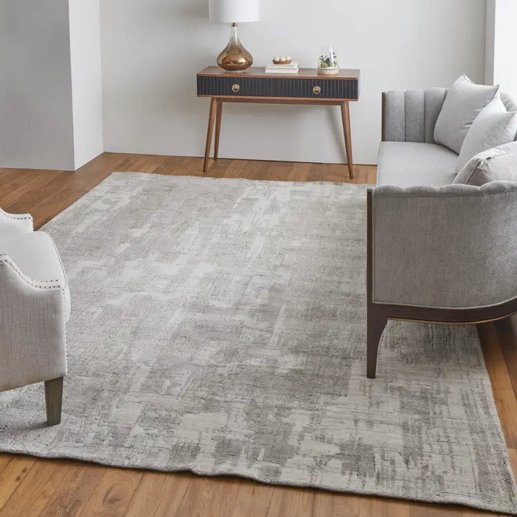4' X 6' Gray and Ivory Abstract Hand Woven Worn Faded Area Rug