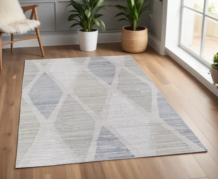 4' X 6' Ivory and Blue Geometric Hand Woven Area Rug