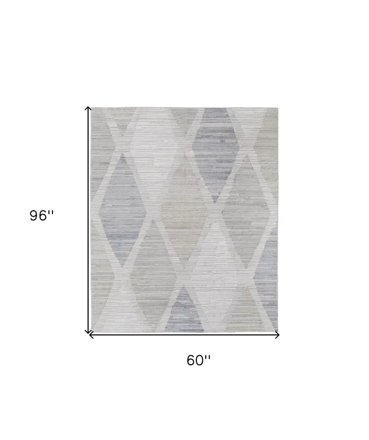 5' X 8' Ivory and Blue Geometric Hand Woven Area Rug