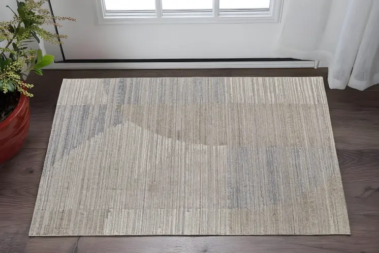 2' X 3' Tan and Blue Abstract Hand Woven Worn Faded Area Rug
