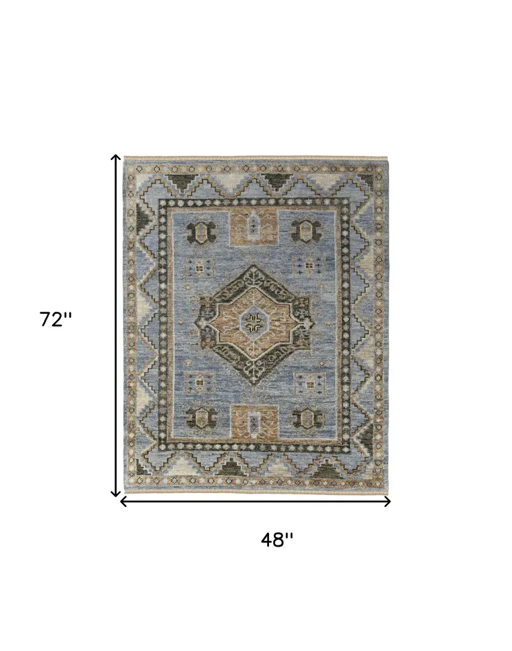 4' X 6' Ivory Tan and Blue Wool Oriental Hand Knotted Area Rug With Fringe