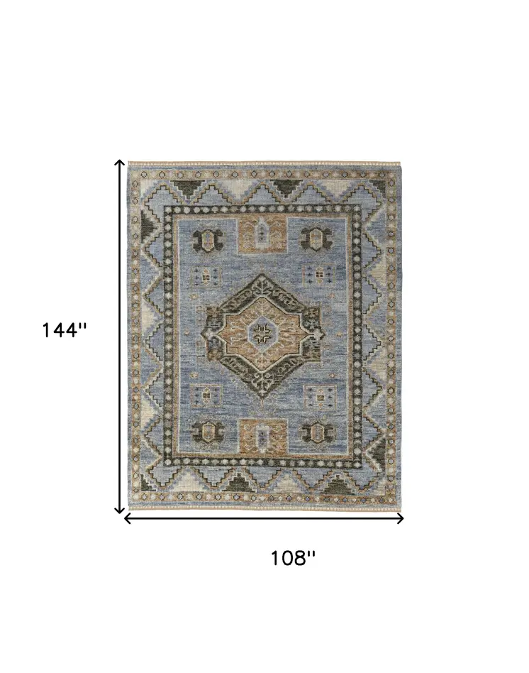 9' X 12' Ivory Tan and Blue Wool Oriental Hand Knotted Area Rug With Fringe