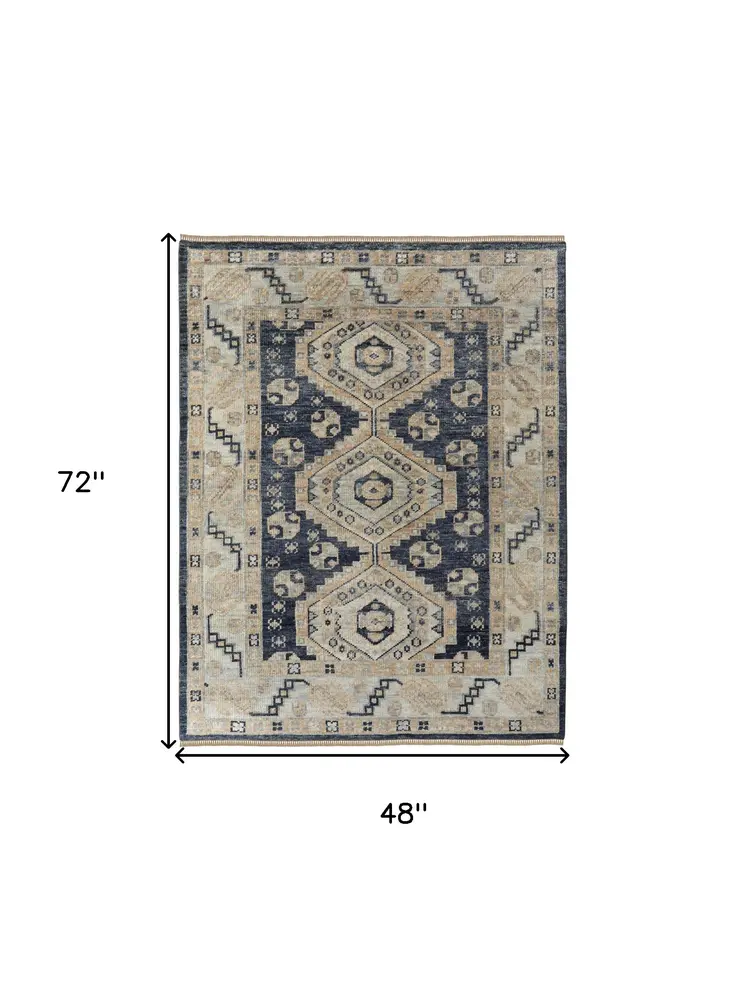 4' X 6' Blue and Ivory Wool Geometric Hand Knotted Area Rug With Fringe