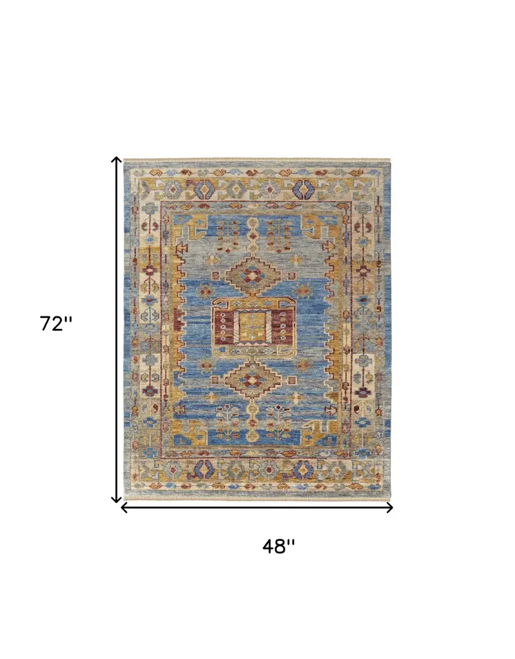 4' X 6' Blue Red and Yellow Wool Geometric Hand Knotted Area Rug With Fringe