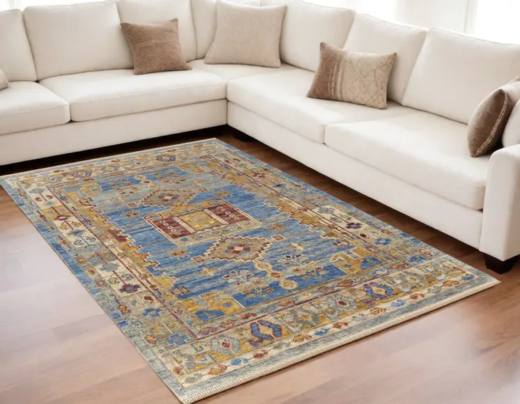 5' X 8' Blue Red and Yellow Wool Geometric Hand Knotted Area Rug With Fringe