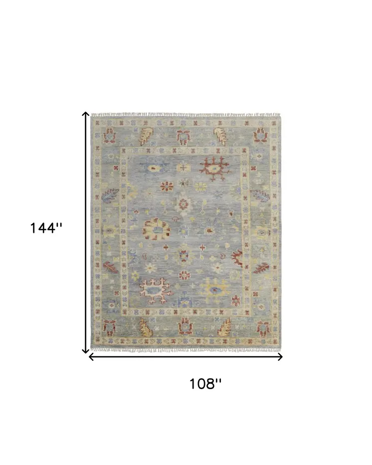 9' X 12' Light Blue and Taupe Wool Floral Hand Knotted Area Rug With Fringe