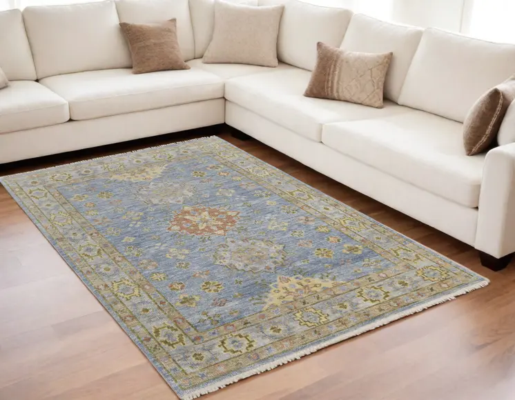 5' X 8' Green Blue and Yellow Wool Geometric Hand Knotted Area Rug With Fringe