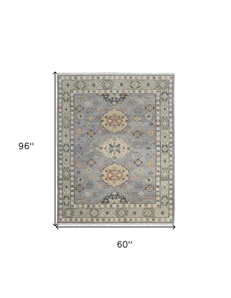 5' X 8' Gray Blue and Taupe Wool Geometric Hand Knotted Area Rug With Fringe