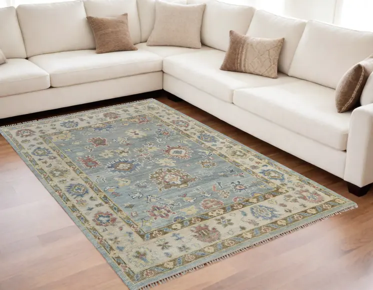 5' X 8' Blue Ivory and Yellow Wool Floral Hand Knotted Area Rug With Fringe