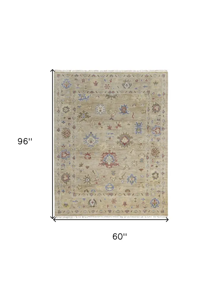 5' X 8' Tan Brown and Blue Wool Floral Hand Knotted Area Rug With Fringe