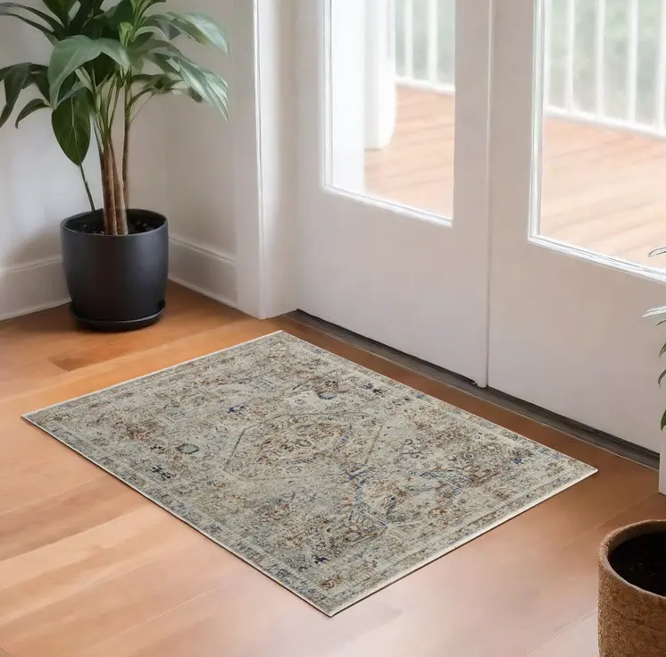 3' X 5' Red Tan and Blue Oriental Power Loom Worn Faded Area Rug With Fringe