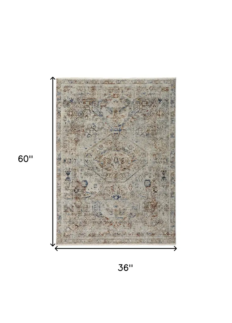 3' X 5' Red Tan and Blue Oriental Power Loom Worn Faded Area Rug With Fringe