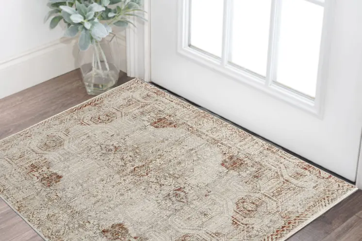 3' X 5' Ivory Gray and Brown Abstract Power Loom Worn Faded Area Rug With Fringe