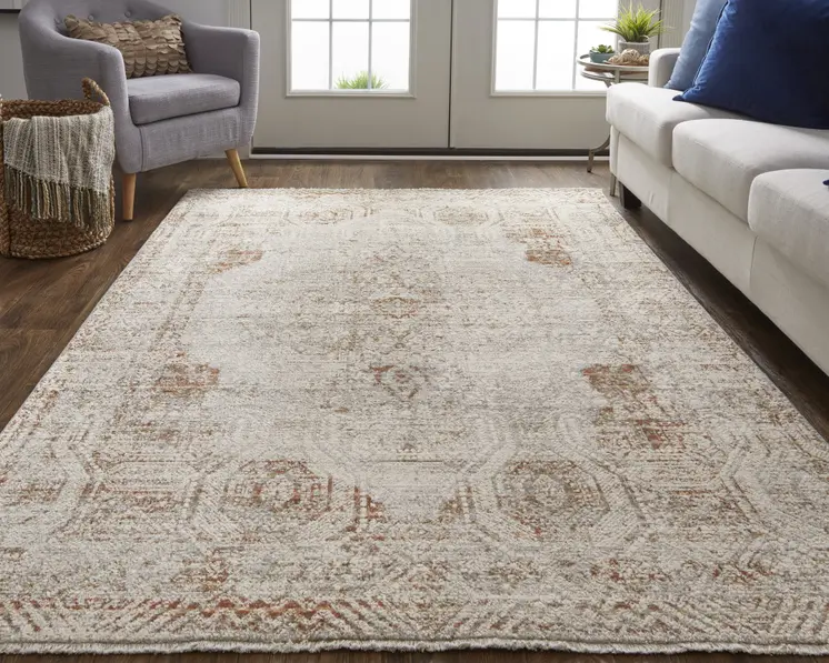 3' X 5' Ivory Gray and Brown Abstract Power Loom Worn Faded Area Rug With Fringe