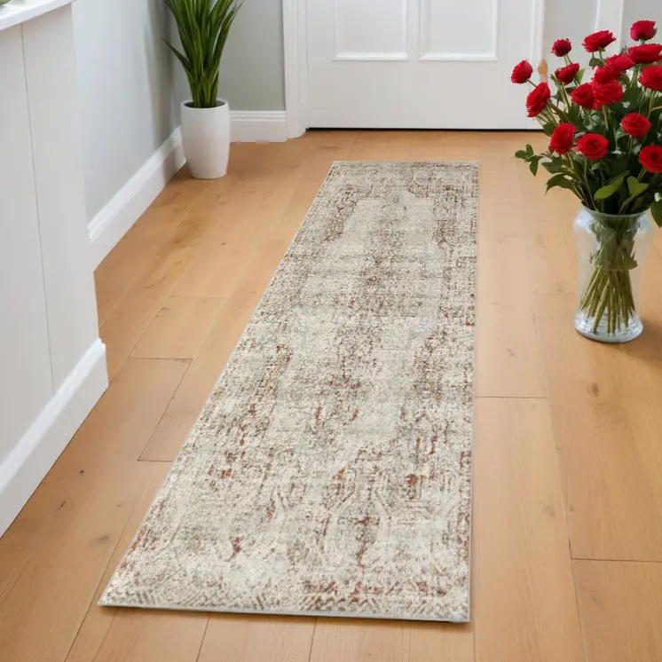 8' Ivory Gray and Brown Abstract Power Loom Worn Faded Runner Rug With Fringe