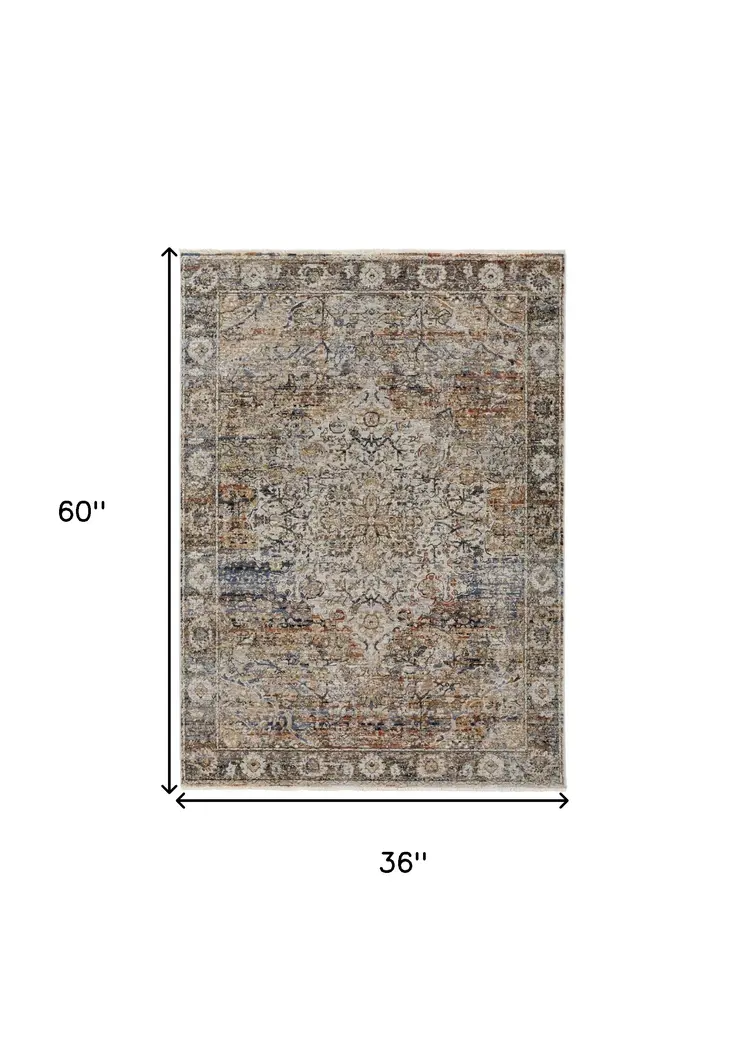 3' X 5' Tan Blue and Brown Oriental Power Loom Area Rug With Fringe