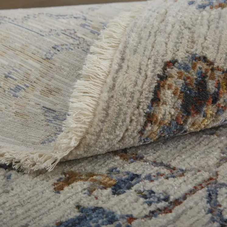 3' X 5' Blue Gray and Brown Floral Power Loom Worn Faded Area Rug With Fringe