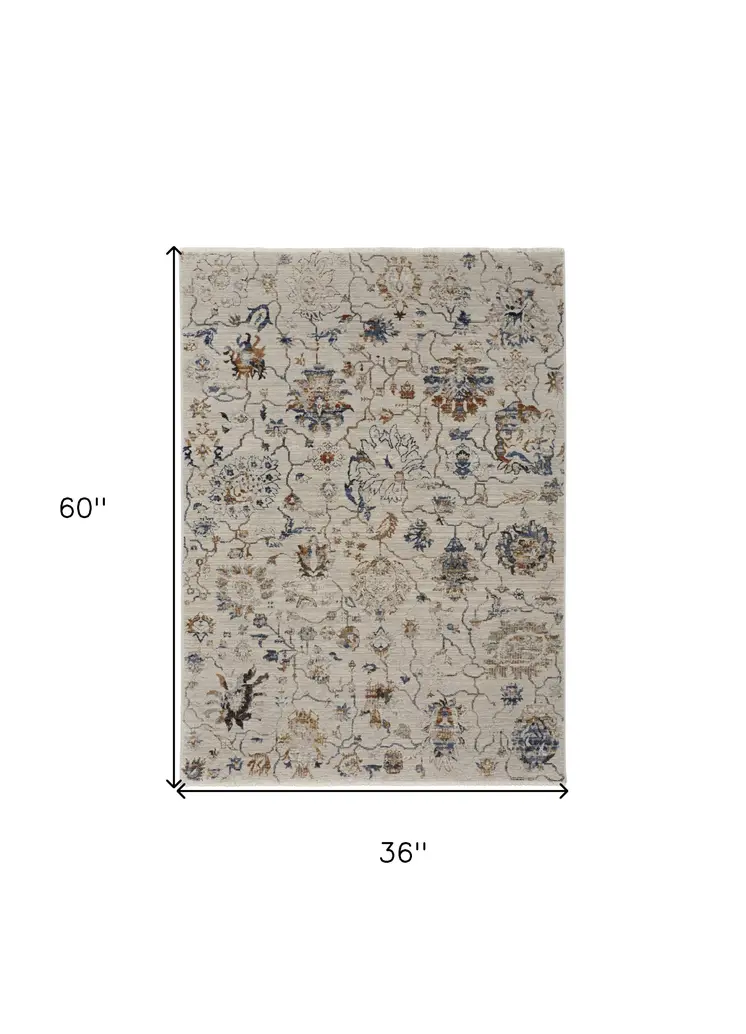 3' X 5' Blue Gray and Brown Floral Power Loom Worn Faded Area Rug With Fringe