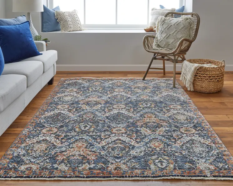 3' X 5' Ivory Blue and Brown Floral Power Loom Area Rug With Fringe