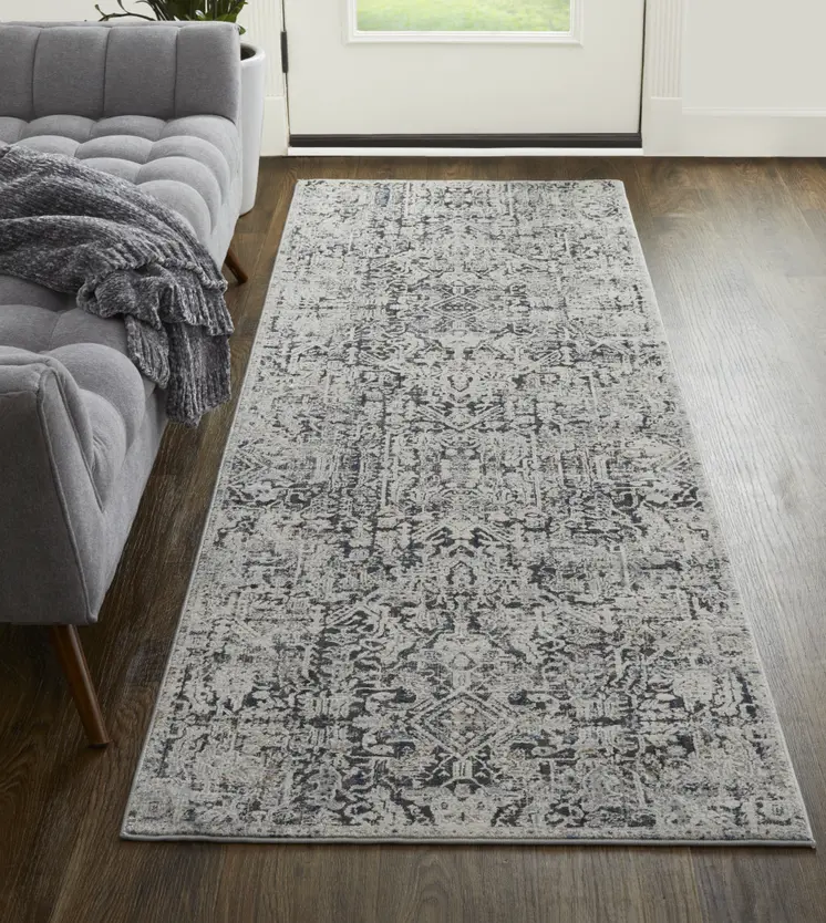 10' Ivory and Gray Abstract Power Loom Worn Faded Runner Rug With Fringe