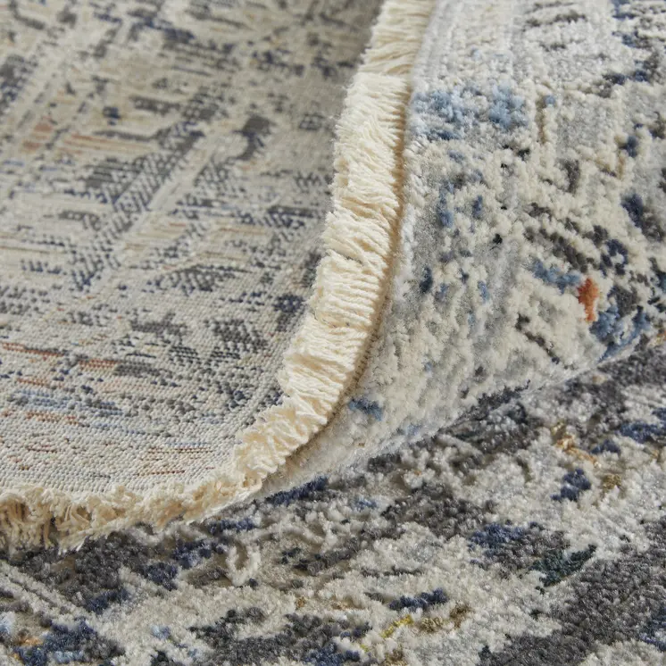8' Ivory and Gray Abstract Power Loom Worn Faded Runner Rug With Fringe