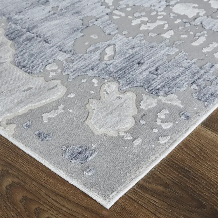 3' X 5' Ivory and Blue Abstract Power Loom Worn Faded Area Rug