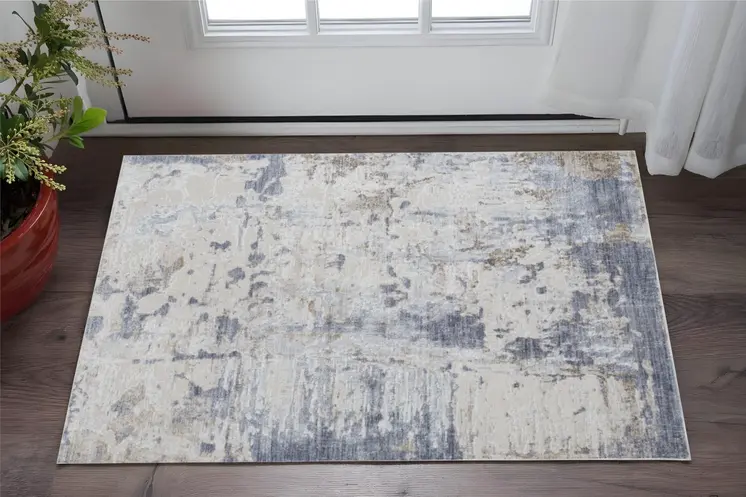 2' X 3' Ivory Gray and Blue Abstract Power Loom Worn Faded Area Rug