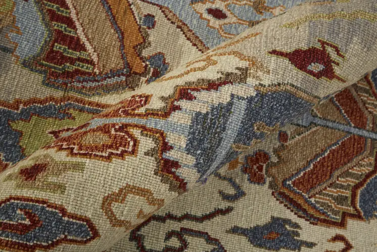 8' X 12' Ivory Blue and Brown Wool Ikat Hand Knotted Area Rug With Fringe