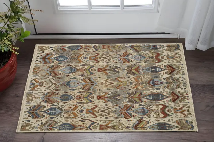 2' X 3' Ivory Blue and Brown Wool Ikat Hand Knotted Area Rug With Fringe