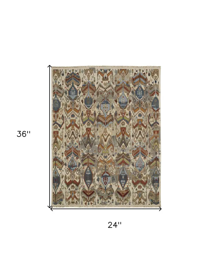 2' X 3' Ivory Blue and Brown Wool Ikat Hand Knotted Area Rug With Fringe
