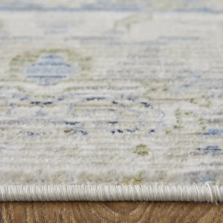 7' X 10' Ivory Green and Blue Abstract Power Loom Worn Faded Area Rug