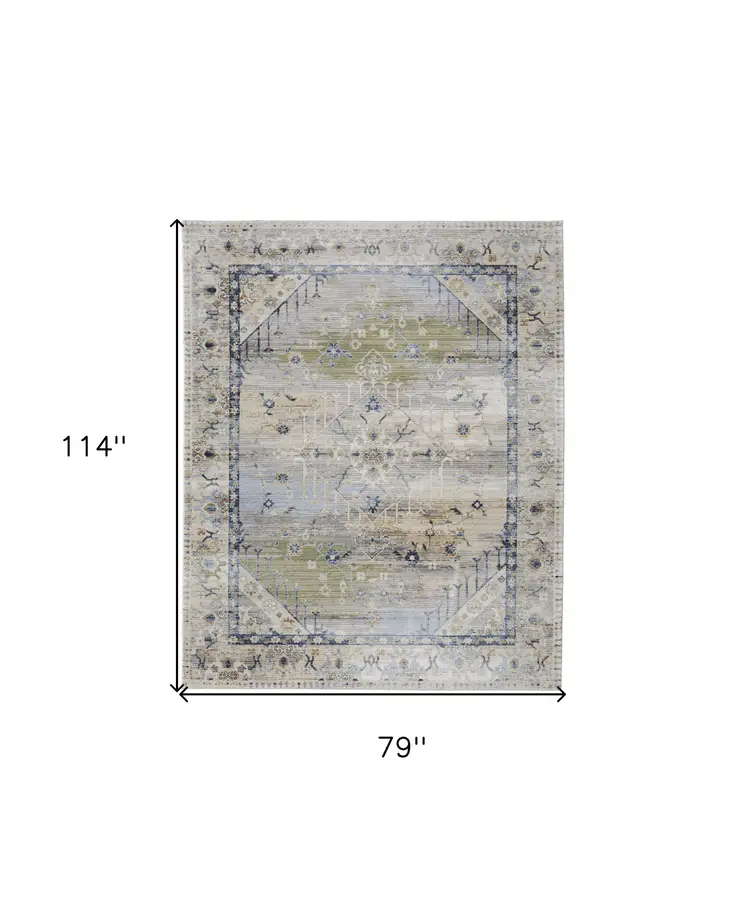 7' X 10' Ivory Green and Blue Abstract Power Loom Worn Faded Area Rug