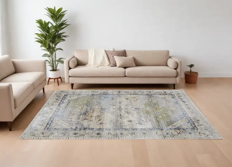 8' X 10' Ivory Green and Blue Abstract Power Loom Worn Faded Area Rug
