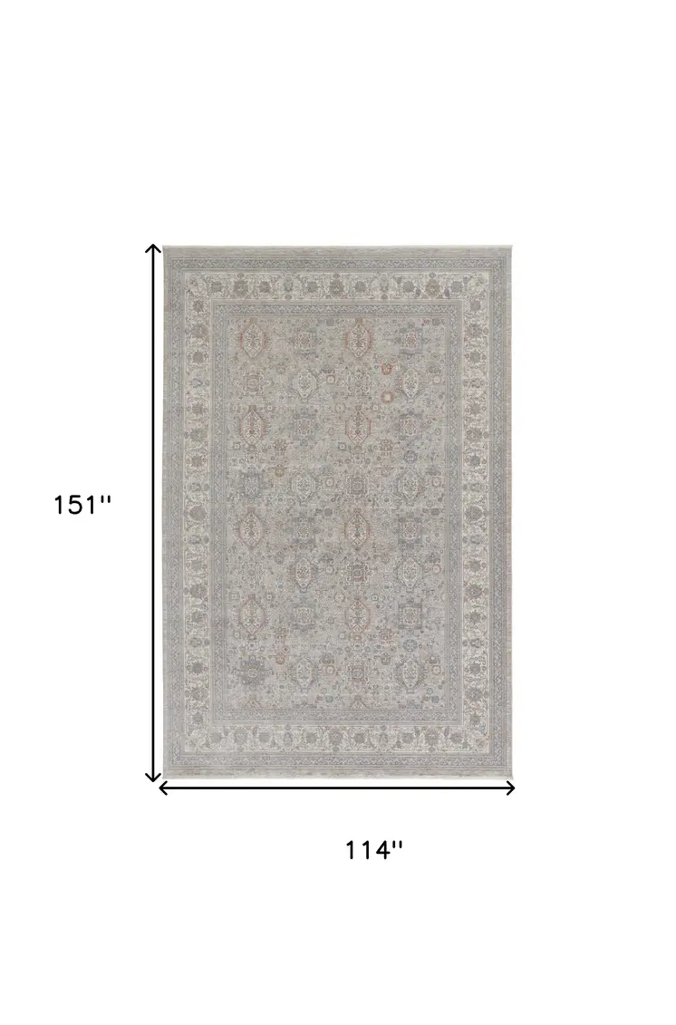 9' X 13' Silver Taupe and Blue Oriental Power Loom Worn Faded Area Rug With Fringe